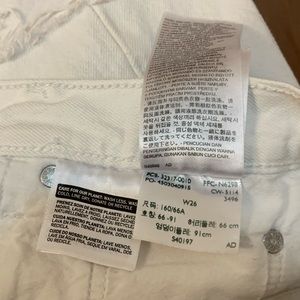 Levi's Shorts - LEVI’S 501 White Raw Hem High Waisted Jean Shorts Levi's Shorts - LEVI’S 501 White Raw Hem High Waisted Jean Shorts